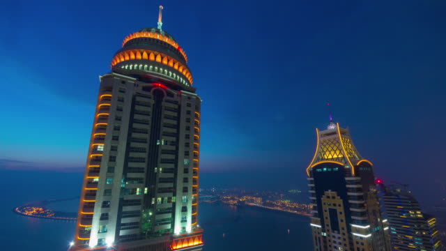 Emiratos-Árabes-Unidos-Dubai-ciudad-edificio-puesta-de-sol-famoso-rascacielos-superior-4-k-lapso-de-tiempo