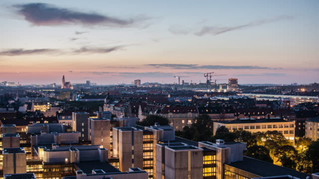 4K-Time-Lapse-Tilt-of-Stockholm-cityscape-at-dusk.-View-of-city-skyline-and-office-buildings