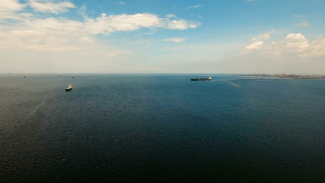 Aerial-Cargo-ships-anchored-in-the-sea.-Philippines,-Manila