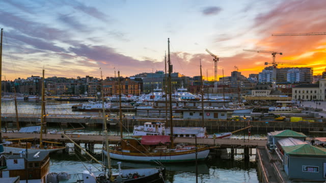 Video-time-lapse-view-of-yachts-in-Oslo-Harbor,-Oslo-Fjord-at-night-in-Oslo-city,-Norway,-timelapse-4K