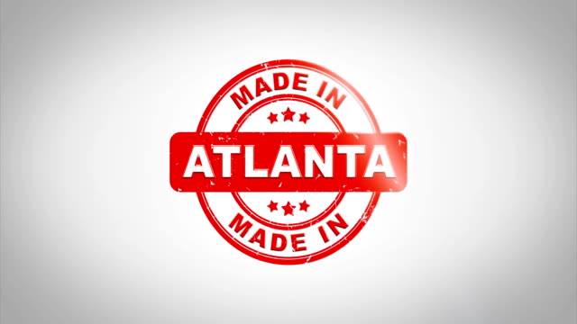 04.-Made-In-ATLANTA-Signed-Stamping-Text-Wooden-Stamp-Animation.-Red-Ink-on-Clean-White-Paper-Surface-Background-with-Green-matte-Background-Included.