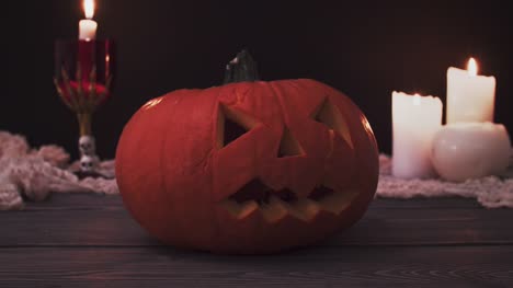 Halloween-pumpkin-with-burning-candles