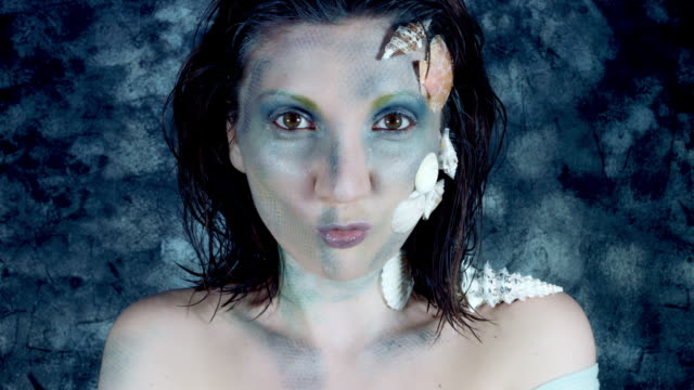4k-Halloween-Shot-of-a-Woman-Mermaid-Grimacing-like-a-Fish
