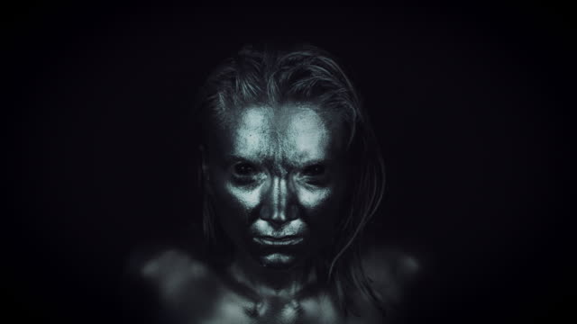 4K-Horror-Woman-with-Silver-Metallic-Make-up-Moving-fast-to-Camera