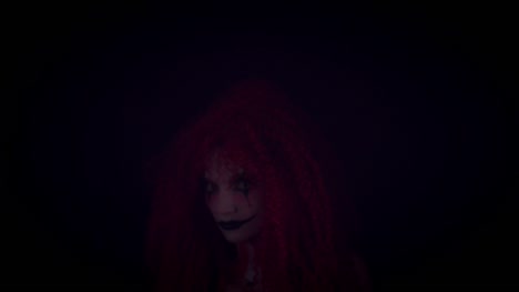 4k-Halloween-Horror-Clown-Woman-Disappearing-into-Dark
