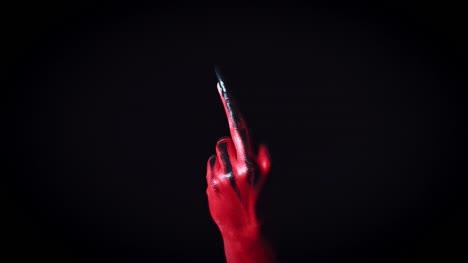 4k-Horror-Devil's-Hand-Showing-Middle-Finger