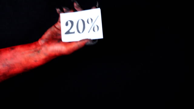 Roter-Dämon-Hand-hält-Verkauf-Karte-20-Prozent-50-fps