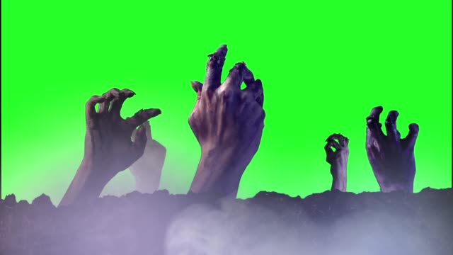 Zombie-hand-auf-einem-grünen-Hintergrund-zu-Halloween