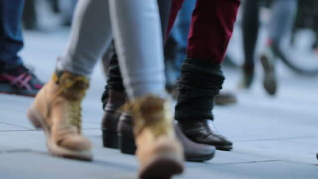 Legs-of-Crowd-People-Walking-on-the-Street.-Close-up-of-Crowd-feet-in-4K-60fps