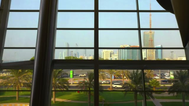 Beautiful-corniche-view-of-Abu-Dhabi-city-skyline-from-glass-interior