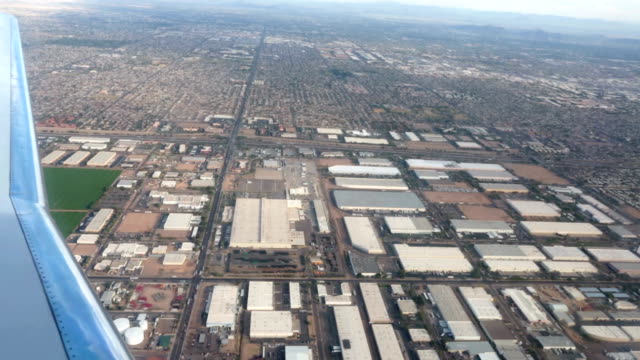 Aerial-airline-approach-Phoenix-Arizona-industrial-area-HD