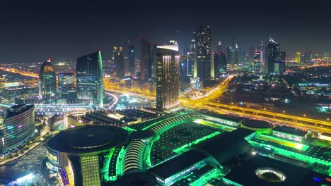 Nacht-Beleuchtung-Dubai-Mall-Dach-Top-Stadtpanorama-4-k-Zeit-verfallen-Vereinigte-Arabische-Emirate