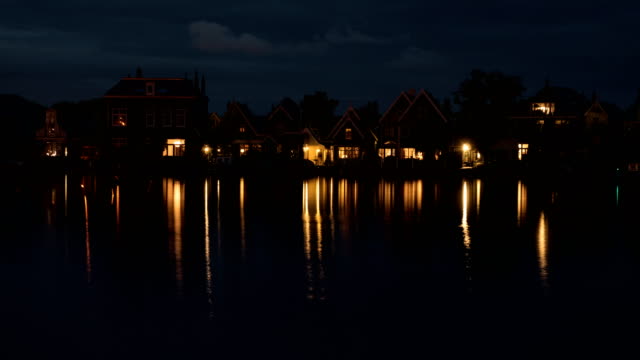 Timelapse-of-night-coming-to-waterside-village-in-Netherlands
