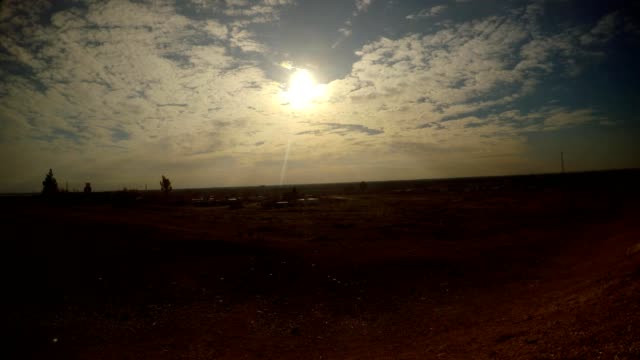 evening-sun-in-the-clouds-above-the-wasteland-on-the-outskirts-of-the-ancient-Arab-city-in-southern-Turkey