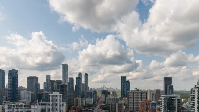Modern-City-Buildings-with-Summer-Clouds