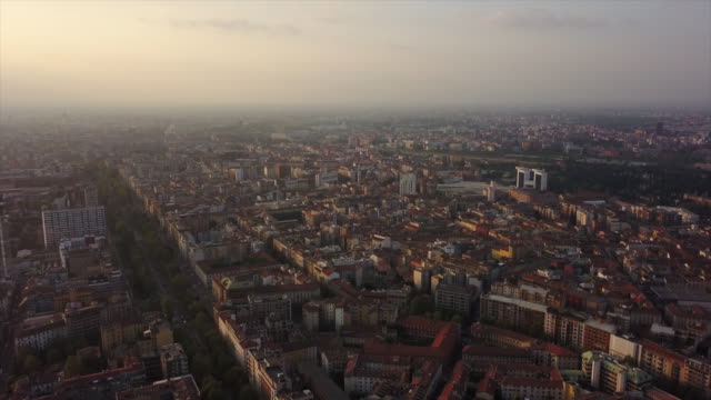 italy-sunset-sky-milan-cityscape-aerial-panorama-4k