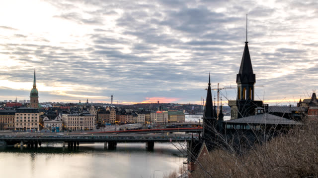 Stockholm-Sweden-time-lapse-4K,-city-skyline-night-to-day-sunrise-timelapse-at-Gamla-Stan-and-Slussen