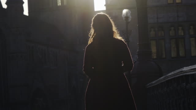 young-girl-on-street-in-silhouette