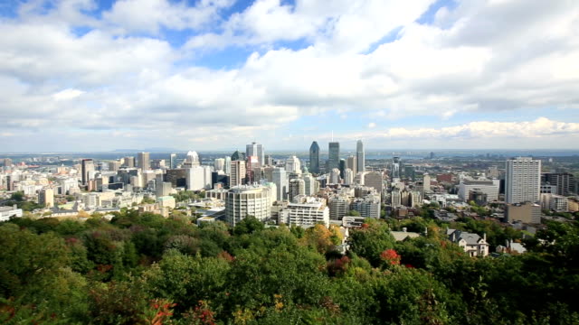 Downhill-view-of-the-Montreal-city-skyline-on-a-sunny-autumn-day
