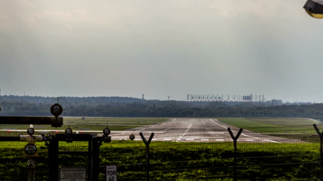 Hamburg-airport-runway-with-landing-and-starting-aircraft---timelapse