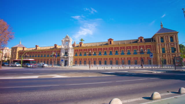 sunny-day-traffic-street-view-on-san-telmo-palace-4k-time-lapse-spain