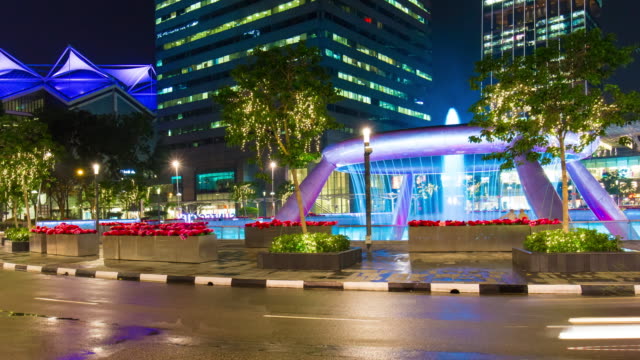 Singapur-noche-tráfico-fuente-círculo-suntec-city-panorama-4k-lapso-de-tiempo