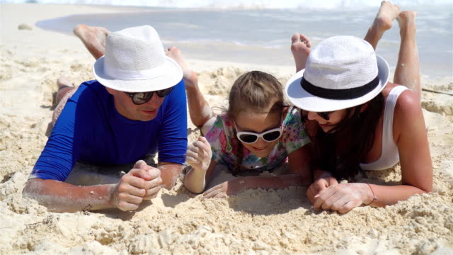 Young-family-on-beach-vacation