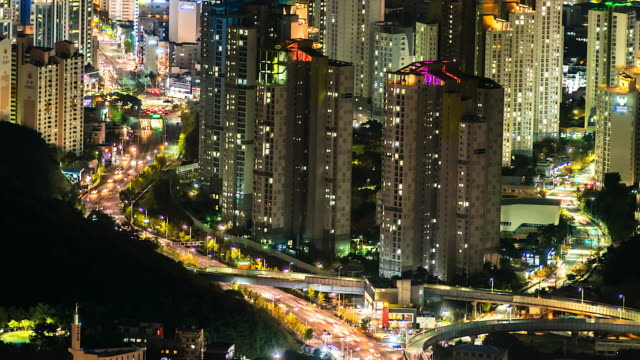 4K,-Time-lapse-view-of-Busan-city-buildings-at-night-of-South-Korea