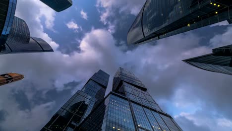 Moscow-Bottom-up-view-of-rotating-skyscrapers-and-fast-moving-clouds