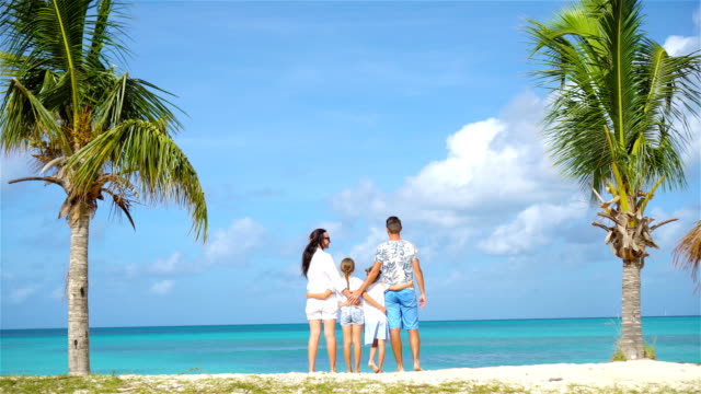 Parents-with-two-kids-enjoy-their-caribbean-vacation-on-Antigua-island