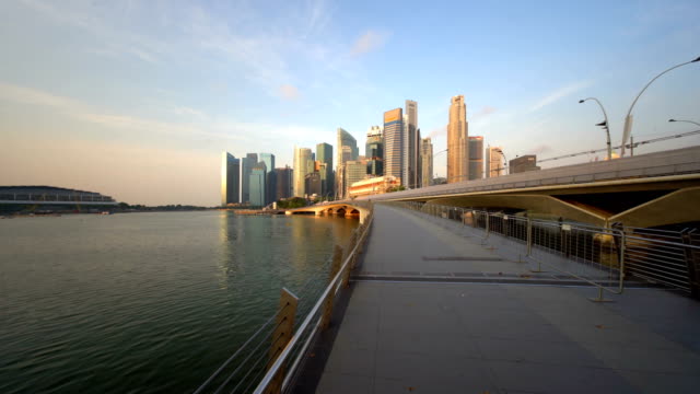 Downtown-Singapore-city-in-Marina-Bay-area-at-sunrise.-Financial-district-and-skyscraper-buildings.