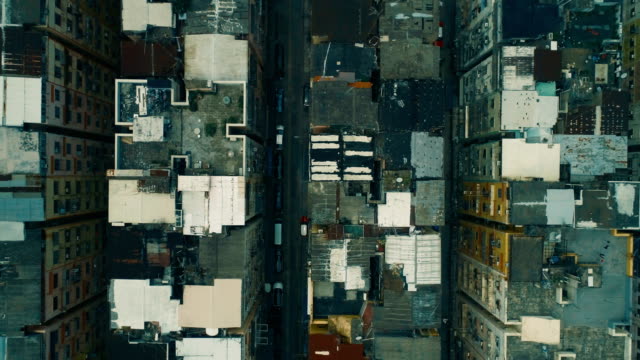Abstract-aerial-drone-footage-of-old-rooftops-in-the-densely-populated-area-in-Hong-Kong