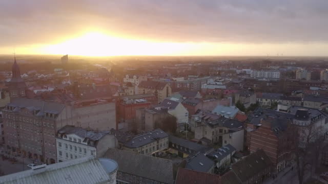 Aerial-view-of-Lund,-Sweden.-Drone-shot-flying-over-Lund-city-at-sunset