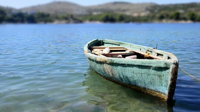 old-fishing-boat-on-sea