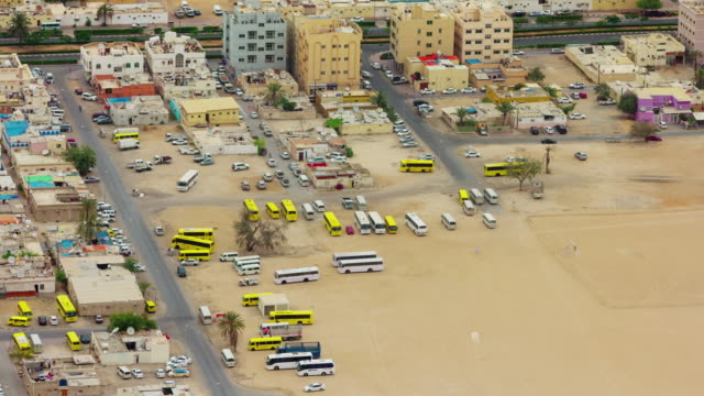 Dubai-Stadt-Dach-führenden-Bauunternehmen-Bus-Station-Panorama-4-k-Zeit-hinfällig,-Vereinigte-Arabische-Emirate