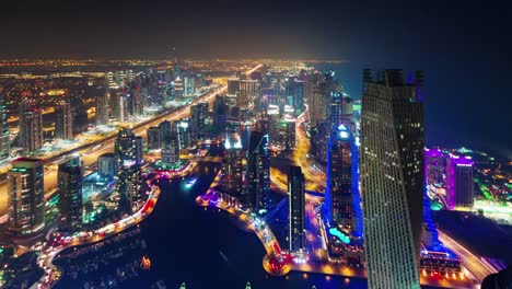 dubai-marina-night-illumination-roof-top-panorama-4k-time-lapse-united-arab-emirates