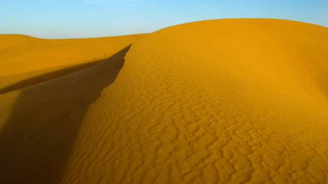 Desert-sand-dunes-during-storm-rotation-timelapse