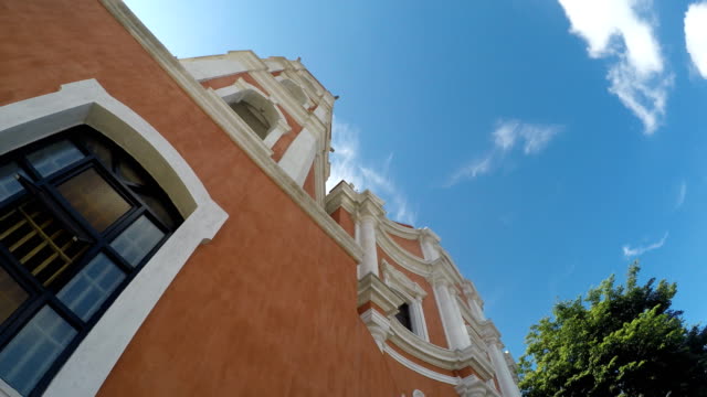 Colonial-16th-century-Spanish-built-of-Saint-Paul-the-First-Hermit-Cathedral,-showing-her-facade.-tracking-shot