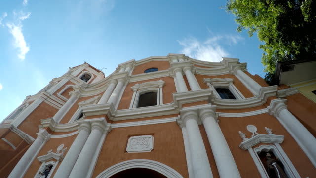 Colonial-16th-century-Spanish-built-of-Saint-Paul-the-First-Hermit-Cathedral,-showing-her-facade.-tracking-shot