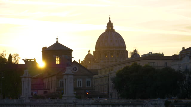 Stunning-golden-evening-sun-rays-shine-on-the-historic-St.-Peter's-Basilica.