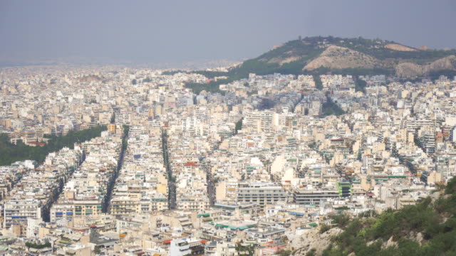 Vista-aérea-de-los-tejados-y-casas-en-Atenas,-Grecia.