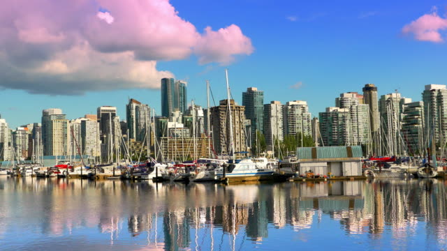 Vancouver-British-Columbia-Canada-Skyline,-Buildings-and-Boats-Reflection