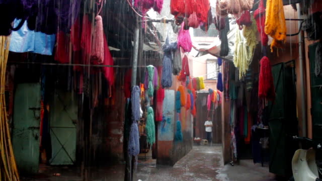 Colored-dyed-yarn-is-dried-on-the-streets-of-Morocco