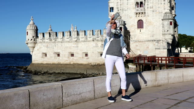 Girl-tourist-taking-a-selfie-photo