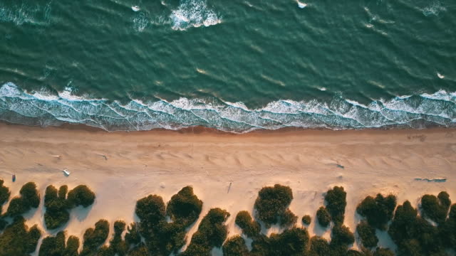 Aerial-video-of-an-Italian-wild-beach-at-sunset