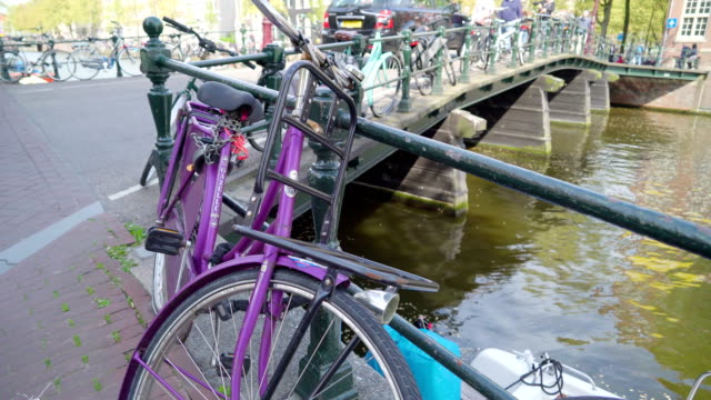 Closer-look-of-the-bicycle-on-the-railings-of-the-bridge