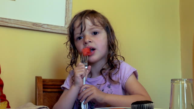 Little-Girl-Eating-Watermelon