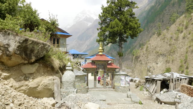 Arch-to-nepalese-village-Lho.-Manaslu-circuit-trek.