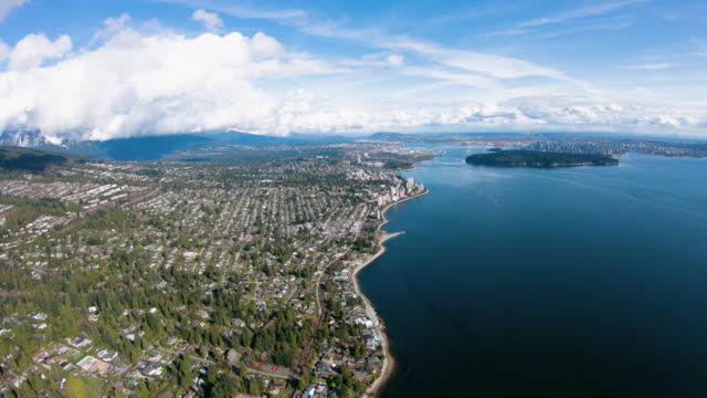 West-Vancouver-BC-Skyline-Aerial-View-Traveling-South-Along-Coastline-Over-Beaches