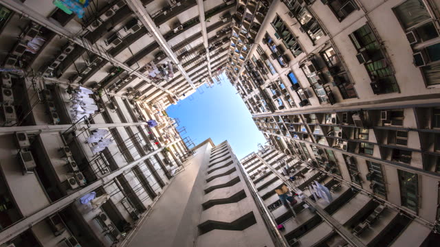 4K.-Antigua-comunidad-de-lapso-de-tiempo,-edificio-residencial-denso-y-colorido-edificio-de-vista-en-la-ciudad-de-Hong-Kong